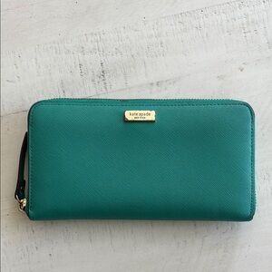 Kate Spade. Continental zip around wallet aqua